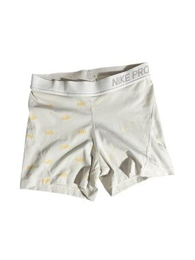 Nike White Shorts with Pale Yellow Logo Print